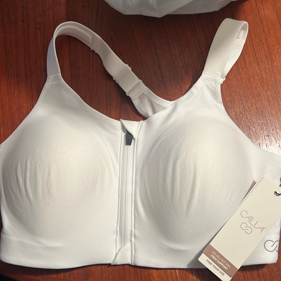 CALIA by Carrie Underwood Other - NWT 34DD white zip up front bra